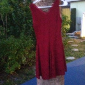 Sleeveless maroon lace dress with flared bottom and slip underneath